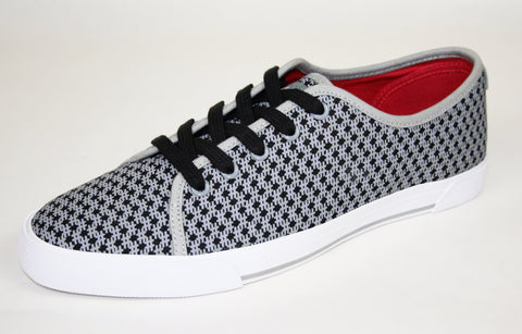 Premium canvas ladies sneaker with unique hashtag pattern.